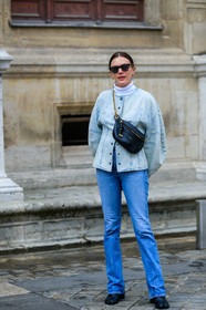 madelynn furlong, denim, denim jacket, denim total look, light blue jacket, light blue jeans, white pullover, turtleneck pullover, balloon sleeves, givenchy bag, black leather bag, crossbody bag, belt bag, golden chain strap bag, metalic frame sunglasses, black sunglasses, flare jeans, black leather boots, margiela boots, camel toe margiela boots, PARIS, PFW, SPRING SUMMER 2020, SS 20, fashion week, frenchystyle, FW, jonathan paciullo, street style, vertical, full length
