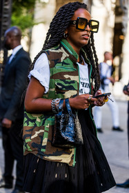 bag, black bag, black t-shirt, bracelet, chain necklace, dior bag, green skirt, leather bag, Lolo Zouai, necklace, pink hair, pleated skirt, printed t-shirt, saddle bag, skirt, t-shirt, vintage t-shirt, street style, jonathan paciullo, FW, frenchystyle, fashion week, PFW, PARIS, SPRING SUMMER 2022, SS 22, vertical, atmosphere details