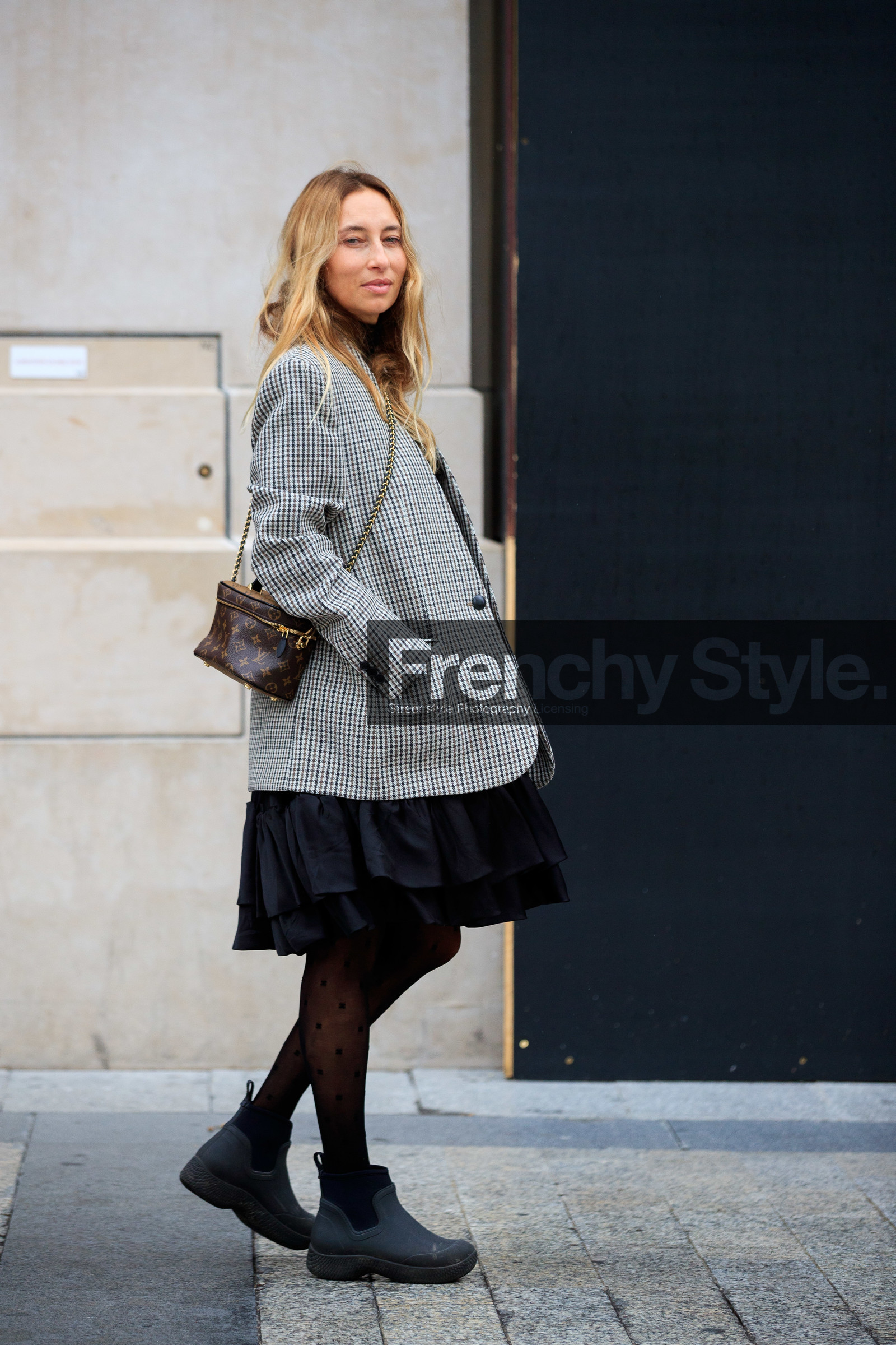 alexandra golovanoff, oversize jacket, checked jacket, beige jacket, black dress, black tights, black boots, ruffle dress, rain boots, low boots, plastic boots, chelsea boots, monogrammed tights, plumetis tights, kaki bag, satin dress, PARIS, PFW, fashion week, frenchystyle, FW, jonathan paciullo, street style, SPRING SUMMER 2021, SS 21, vertical, full length