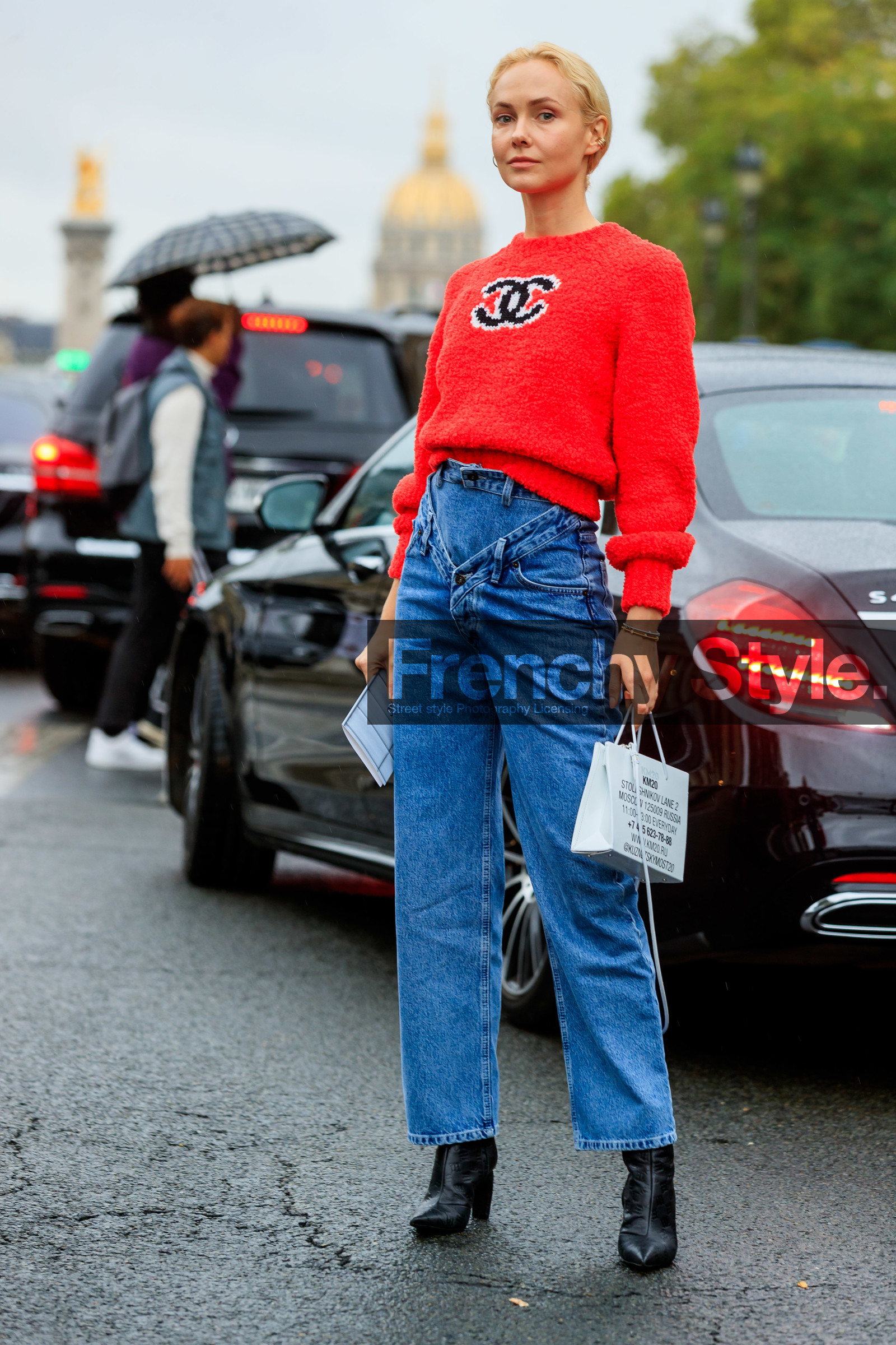 olga karput, red pullover, chanel pullover, blue jeans, denim, flare jeans, white leather bag, hand bag, black leather boots, monogrammed boots, PARIS, PFW, SPRING SUMMER 2020, SS 20, fashion week, frenchystyle, FW, jonathan paciullo, street style, vertical, full length