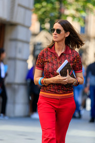 emily zak, jacquard polo shirt, red polo shirt, red pants, metalic frame sunglasses, louis vuitton clutch, monogrammed bag, blue bracelet, multi bracelet, brown scale bracelet, fashion week, frenchystyle, FW, jonathan paciullo, street style, vertical, detail, atmosphere details