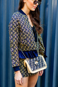 beige bag, black top, bomber jacket, fendi, graphic bag, graphic jacket, graphic skirt, leather bag, mary leest, monogram, printed bag, printed jacket, printed skirt, sunglasses, yellow jacket, yellow skirt, street style, jonathan paciullo, FW, frenchystyle, fashion week, MFW, MILAN, SPRING SUMMER 2019, SS 19, vertical, atmosphere details, detail