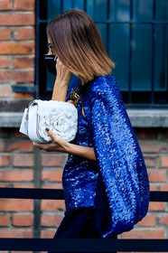 valentino necklace, valentino bag, valentino blouse, blue blouse, sequins blouse, sequins cape, blue cape, white leather bag, flower bag, patchwork bag, close up detail, bag detail, covid face mask, giorgia tordini, street style, jonathan paciullo, FW, frenchystyle, fashion week, MFW, MILAN, SPRING SUMMER 2021, SS 21, vertical, detail