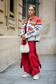red leather jacket, white leather jacket, patchwork jacket, letter embroidered jacket, logo all over, logo printed jacket, motard bombers, red pants, oversize pants, oversize bombers, oversize jacket, white leather bag, white sunglasses, gucci bag, jackie gucci bag, white leather sneakers, nike shoes, hera pradel, fashion week, frenchystyle, FW, jonathan paciullo, street style, PFW, PARIS, SPRING SUMMER 2022, SS 22, vertical, full length