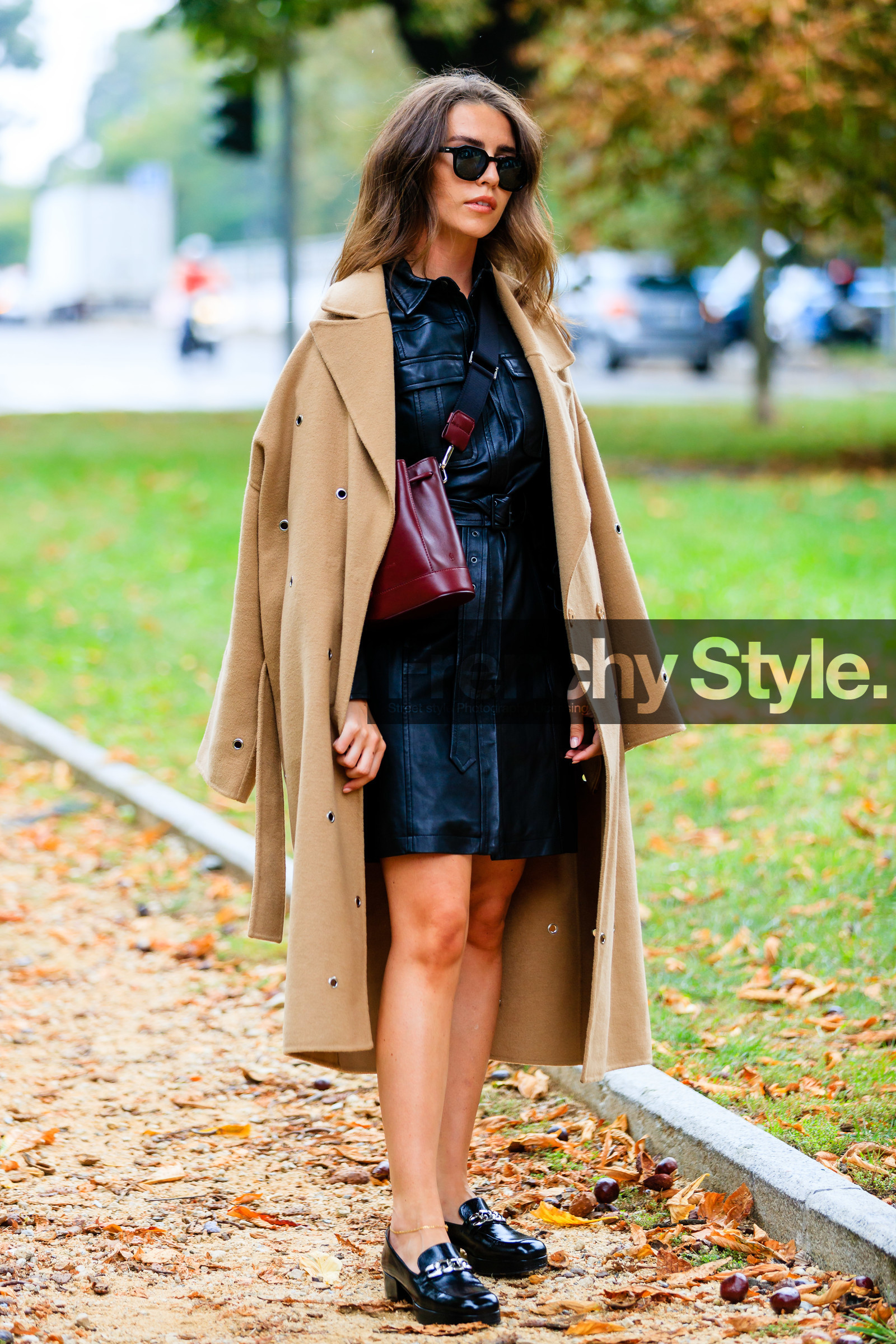 black leather dress, mini dress, button dress, belted dress, burgundy leather bag, bucket bag, crossbody bag, black sunglasses, black leather loafers, golden bracelet, ankle bracelet, camel coat, beige coat, openwork coat, studs coat, sarah lou falk, street style, jonathan paciullo, FW, frenchystyle, fashion week, MFW, MILAN, SPRING SUMMER 2021, SS 21, vertical, full length