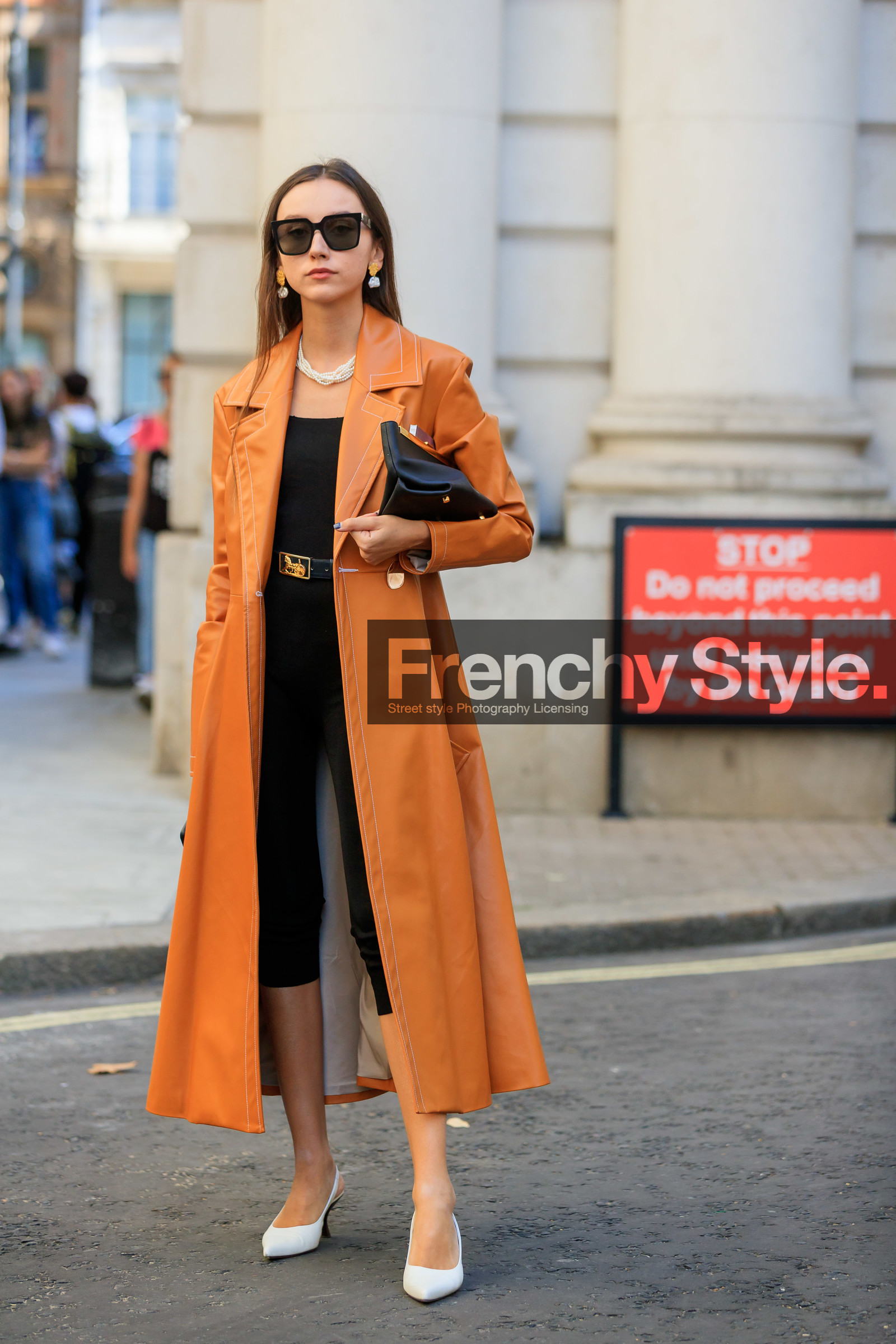 beatrice gutu, orange trench, leather trench coat, long coat, long trench coat, black legging, black top, celine belt, black leather belt, celine sunglasses, black leather clutch, black sunglasses, square shape glasses, pearl necklace, multi earrings, white shoes, sling back shoes, pearl earrings, fashion week, frenchystyle, FW, jonathan paciullo, street style, vertical, full length