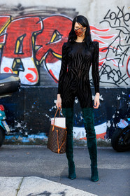 black jumpsuit, velvet jumpsuits, zebra printed jumsuit, long sleeves jumpsuit, tight jumpsuit, tight boots, suede boots, high boots, green boots, green suede boots, monogrammed bag, brown leather bag, louis vuitton bag, hand bag, shopping bag, animal print, leopard print, covid face mask, hannah elyse, street style, jonathan paciullo, FW, frenchystyle, fashion week, MFW, MILAN, SPRING SUMMER 2021, SS 21, vertical, full length, model