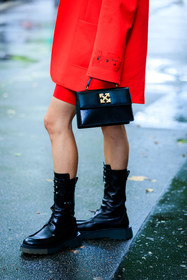 black leather bag, black bag, hand bag, off white bag, bag detail, close up detail, black leather boots, black boots, laced boots, flat boots, high boots, red shorts, off white total look, off white boots, big sole boots, regina anikiy, fashion week, frenchystyle, FW, jonathan paciullo, street style, PFW, PARIS, AUTUMN WINTER 2021-2022, FALL WINTER 2021-2022, FW 21-22, vertical, atmosphere details, detail