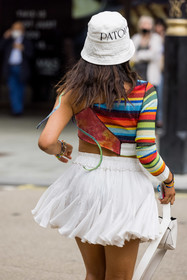 Selma Kaci, patou, knitted top, bucket hat, mini dress, ruffles, white, one sleeve, top, stripes, knits, acne studios, handbag, bracelet, fashion week, frenchystyle, FW, jonathan paciullo, street style, SPRING SUMMER 2022, SS 22, LFW, LONDON, vertical, atmosphere details, detail
