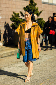 yellow short parka, parka jacket, black bra, denim short, green mini bag, furry sandals, beige sandals, plaid boxers, multicolor underwear, overlayed necklaces, fashion week, frenchystyle, FW, jonathan paciullo, street style, NYFW, NEW YORK, AUTUMN WINTER 2022-2023, FALL WINTER 2022_2023, FW 22-23, vertical, atmosphere details