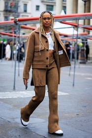 blond braids, long braids, transparent glasses, camel jacket, cropped tshirt, white tshirt, golden necklace, buttoned cardigan, camel cardigan, pleated trousers, camel trousers, knitwear, knits, mini bag, chiquito bag, jacquemus bag, white shoes, moon boots, fashion week, frenchystyle, FW, jonathan paciullo, street style, PFW, PARIS, menswear, AUTUMN WINTER 2022-2023, FALL WINTER 2022-2023, FW 22-23, full length, vertical