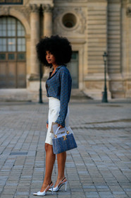 sharon alexie, blue shirt, blue bag, monogrammed shirt, low necked shirt, white skirt, ruffle skirt, mini skirt, hand bag, tweed bag, long necklace, golden necklace, animal shape necklace, charms necklace, louis vuitton bag, louis vuitton necklace, louis vuitton shirt, louis vuitton skirt, louis vuitton total look, louis vuitton shoes, sharp end shoes, white leather bag, white leather shoes, sling back shoes, silvered shoes, PARIS, PFW, SPRING SUMMER 2020, SS 20, fashion week, frenchystyle, FW, jonathan paciullo, street style, vertical, full length