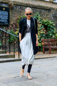 alexandra carl, black and white look, white skirt, silk skirt, mid long skirt, black legging, white t-shirt, embroidered t-shirt, used skirt, used t-shirt, black jacket, long jacket, multi straps sandals, white sandals, butterfly sunglasses, black sunglasses, hoop earrings, golden earrings, aviator glasses, fashion week, frenchystyle, FW, jonathan paciullo, street style, vertical, full length