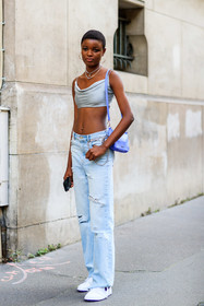 grey top, light grey top, sleeveless top, cropped top, light blue jeans, used jeans, flare jeans, denim, nike shoes, multi necklace, pearl necklace, silvered necklace, chain necklace, fashion week, frenchystyle, FW, jonathan paciullo, street style, PFW, PARIS, AUTUMN WINTER 2021-2022, FALL WINTER 2021-2022, FW 21-22, vertical, full length, model