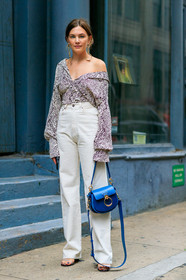 animal print, blue bag, brown shirt, chloé, denim pants, earrings, graphic shirt, jeans, leather bag, leather shoes, off the shoulder, printed shirt, trousers, white denim, zebra, fashion week, frenchystyle, FW, jonathan paciullo, street style, NYFW, NEW YORK, SPRING SUMMER 2019, SS 19, vertical, full length