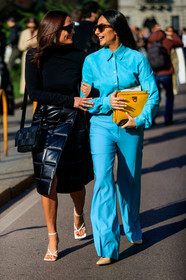 nausheen shah, light blue shirt, light blue pants, yellow leather clutch, ferragamo bag, silk shirt, flare pants, scale sunglasses, bottega veneta sunglasses, black pullover, black leather bag, black leather skirt, black sunglasses, plaited bag, plaited leather bag, quilted skirt, wrap skirt, bottega veneta skirt, bottega veneta bag, bottega veneta shoes, white leather sandals, squared toed shoes, multi straps sandals, celine sunglasses, fashion week, frenchystyle, FW, jonathan paciullo, street style, MFW, MILAN, AUTUMN WINTER 2020-2021, FALL WINTER 2020-2021, FW 20-21, vertical, full length
