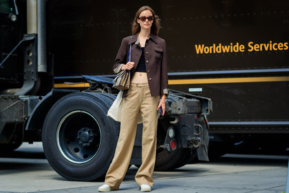 atmosphere details, beige pants, black top, brown jacket, cropped top, Estella Brons, fashion week, frenchystyle, full length, FW, gucci, horizontal, jonathan paciullo, leather bag, model, monogram, NEW YORK, NYFW, printed bag, SPRING SUMMER 2018, SS 18, street style, sunglasses, trousers, white sneakers