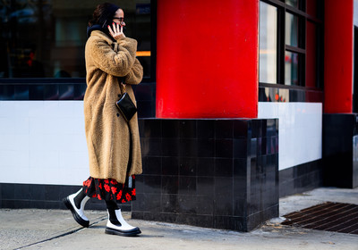 beige jacket, black bag, black skirt, black sweater, camel coat, céline, embroidered skirt, floral, flowers, Fur coat, graphic skirt, headband, hoodie, leather bag, leather shoes, printed skirt, shearling, sunglasses, white boots, street style, jonathan paciullo, FW, frenchystyle, fashion week, NYFW, NEW YORK, AUTUMN WINTER 2018-2019, AW 18-19, FALL WINTER 2018-2019, FW 18-19, atmosphere details, horizontal, full length, Lucy Chadwick