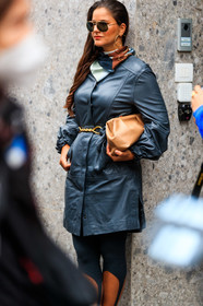 dark green jacket, dark green coat, leather coat, leather jacket, belted coat, belted jacket, golden buckle belt, beige leather clutch, metalic frame sunglasses, aviator sunglasses, rayban sunglasses, legging pants, slim pants, black pants, silk scarf, chain printed scarf, cropped pants, golden earrings, round shape earrings, big earrings, brown scarf, blue scarf, street style, jonathan paciullo, FW, frenchystyle, fashion week, MFW, MILAN, SPRING SUMMER 2021, SS 21, vertical, detail