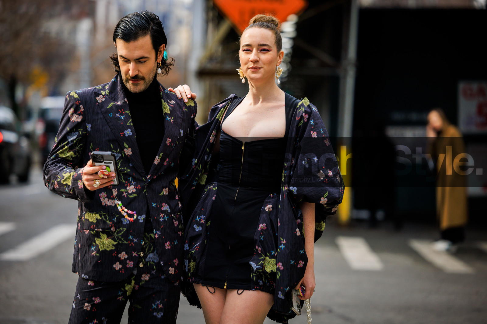 mini black dress, zipped mini dress, couples matching, high bow tail, pendant earring, printed jacket, flowered jacket, flower suit, printed suit, black turtleneck, young emperors, street style, jonathan paciullo, FW, frenchystyle, fashion week, NYFW, NEW YORK, AUTUMN WINTER 2022-2023, FALL WINTER 2022_2023, FW 22-23, atmosphere details, horizontal