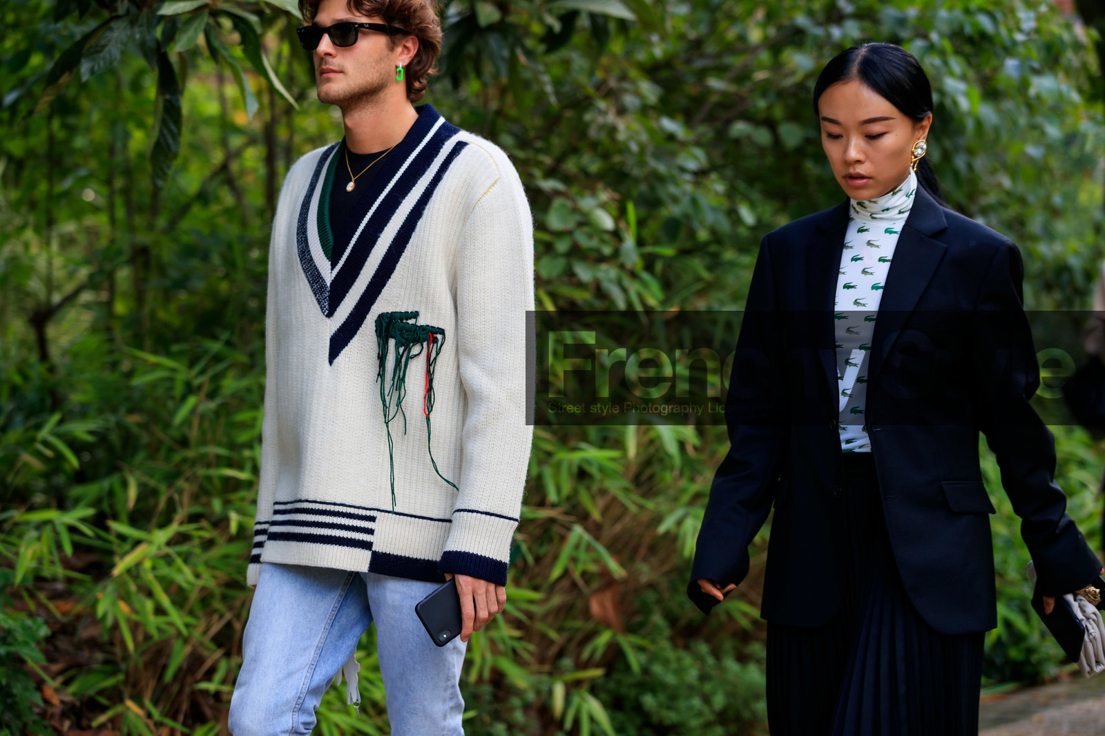 black jacket, black skirt, pleated skirt, white top, monogrammed top, green top, high collar top, lacoste pullover, lacoste top, white pullover, low necked pullover, asymetrical pullover, striped pullover, used pullover, PARIS, PFW, SPRING SUMMER 2020, SS 20, fashion week, frenchystyle, FW, jonathan paciullo, street style, horizontal, atmosphere details, detail