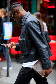 black leather jacket, brown leather clutch, monogrammed jacket, monogrammed clutch, logo all over, logo printed jacket, logo printed clutch, louis vuitton bag, louis vuitton jacket, fashion week, frenchystyle, FW, jonathan paciullo, street style, PFW, PARIS, SPRING SUMMER 2022, SS 22, vertical, atmosphere details, detail