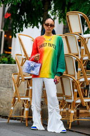 tie and dye sweatshirt, red sweatshirt, yellow sweatshirt, green sweatshirt, white pants, flare pants, sheer bag, plastic bag, hand bag, off white bag, pearl necklace, multicolor necklace, lucky charm necklace, hera pradel, fashion week, frenchystyle, FW, jonathan paciullo, street style, PFW, PARIS, SPRING SUMMER 2022, SS 22, vertical, full length