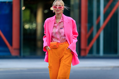 leonie hanne, color block look, neon pink jacket, oversize jacket, miu miu shirt, neon pink shirt, pink sunglasses, future shape sunglasses, sheer shirt, orange pants, oversize pants, jacquemus bag, mini bag, belt bag, orange leather bag, animal skin bag, strassed earrings, big earrings, fashion week, frenchystyle, FW, jonathan paciullo, street style, atmosphere details, horizontal, detail