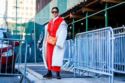 black shoes, earrings, Fur coat, leather bag, leather shoes, off the shoulder, orange bag, red jumpsuit, sunglasses, white coat, white fur, white sweater, street style, jonathan paciullo, FW, frenchystyle, fashion week, NYFW, NEW YORK, AUTUMN WINTER 2018-2019, AW 18-19, FALL WINTER 2018-2019, FW 18-19, atmosphere details, horizontal, full length, bettina looney
