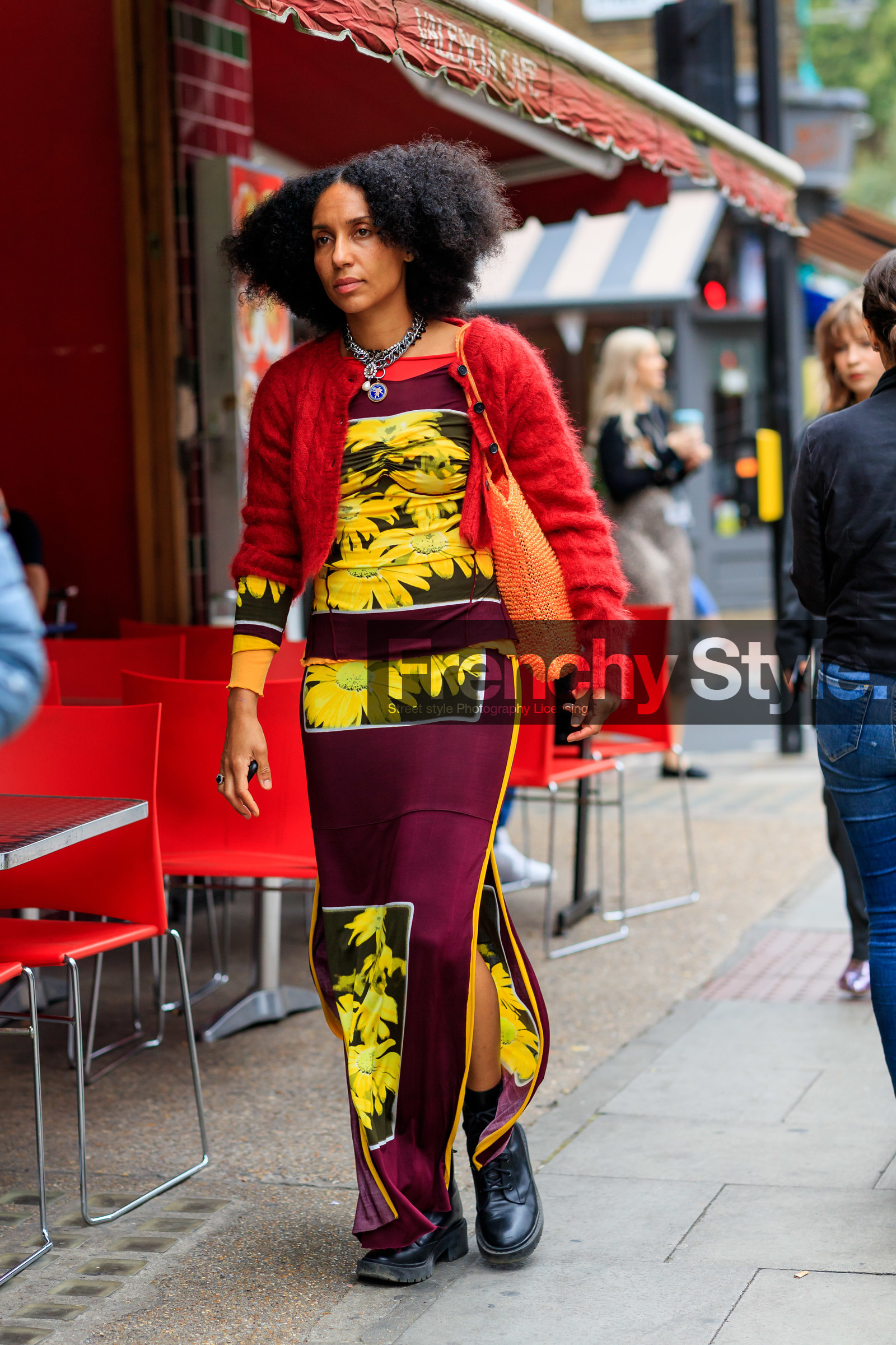 red cardigan, burgundy top, yellow top, floral printed top, burgundy skirt, yellow skirt, floral printed skirt, split skirt, black leather boots, doc marteens shoes, laced boots, chain necklace, silver necklace, shopping bag, knit shopping bag, orange bag, fashion week, frenchystyle, FW, jonathan paciullo, street style, vertical, full length