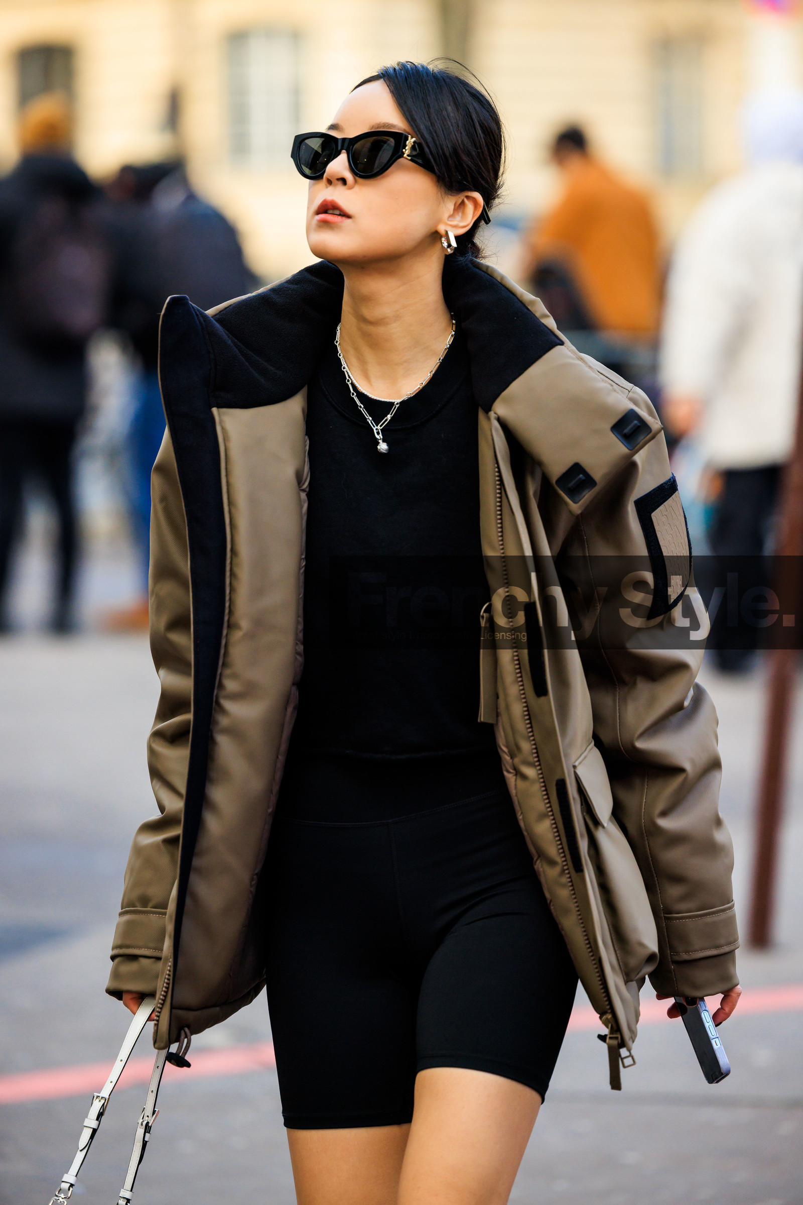 black sunglasses, golden loops, silver necklaces, black body suit, winter jacket, sporty look, white handbag, prada bag, puffed jacket, brown jacket, fashion week, frenchystyle, FW, jonathan paciullo, street style, PFW, PARIS, menswear, AUTUMN WINTER 2022-2023, FALL WINTER 2022-2023, FW 22-23, atmosphere details, detail, vertical