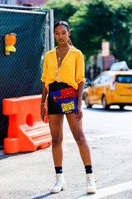 black skirt, black socks, blue bag, fanny pack, graphic bag, leather shoes, leather skirt, multicolor bag, necklace, nike, printed bag, red bag, sunglasses, white boots, yellow shirt, fashion week, frenchystyle, FW, jonathan paciullo, street style, NYFW, NEW YORK, SPRING SUMMER 2019, SS 19, vertical, full length