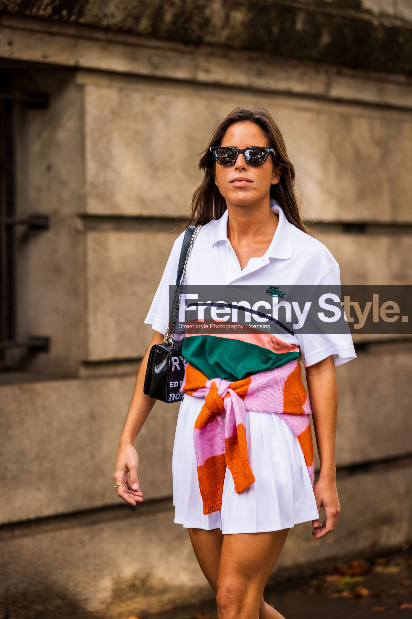 bag, black bag, black sunglasses, color, jumper, lacoste look, Nina Urgell Cloquell, orange jumper, pink jumper, pleated skirt, polo, skirt, stripes, sunglasses, tennis look, white polo, white skirt, lacoste, fashion week, frenchystyle, FW, jonathan paciullo, street style, PFW, PARIS, SPRING SUMMER 2022, SS 22, vertical, atmosphere details