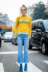 AUTUMN WINTER 2017-2018, AW 17-18, blue denim, blue shoes, bun, denim pants, earrings, FALL WINTER 2017-2018, fashion week, frenchystyle, full length, FW, FW 17-18, high heels, jeans, jonathan paciullo, leather shoes, message, MFW, MILAN, necklace, printed sweater, stars, street style, sunglasses, trousers, vertical, yellow sweater