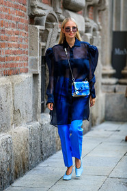 blue total look, blue blouse, blue pants, blue bag, blue leather bag, organza blouse, sheer blouse, balloon sleeves, oversize shoulder, floral printed bag, crossbody bag, golden earrings, valentino bag, valentino earrings, light blue pumps, leather pumps, metalic frame sunglasses, smoked sunglasses, square shape glasses, leonie hanne, street style, jonathan paciullo, FW, frenchystyle, fashion week, MFW, MILAN, SPRING SUMMER 2021, SS 21, vertical, full length