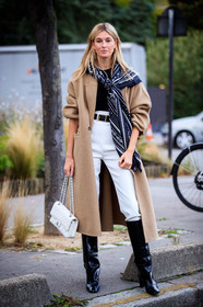 camille charriere, beige coat, white pants, high waist pants, high boots, black scarf, black polish boots, bandana, bandana scarf, hermes scarf, white leather bag, quilted bag, chanel bag, black leather boots, PARIS, PFW, fashion week, frenchystyle, FW, jonathan paciullo, street style, SPRING SUMMER 2021, SS 21, vertical, full length