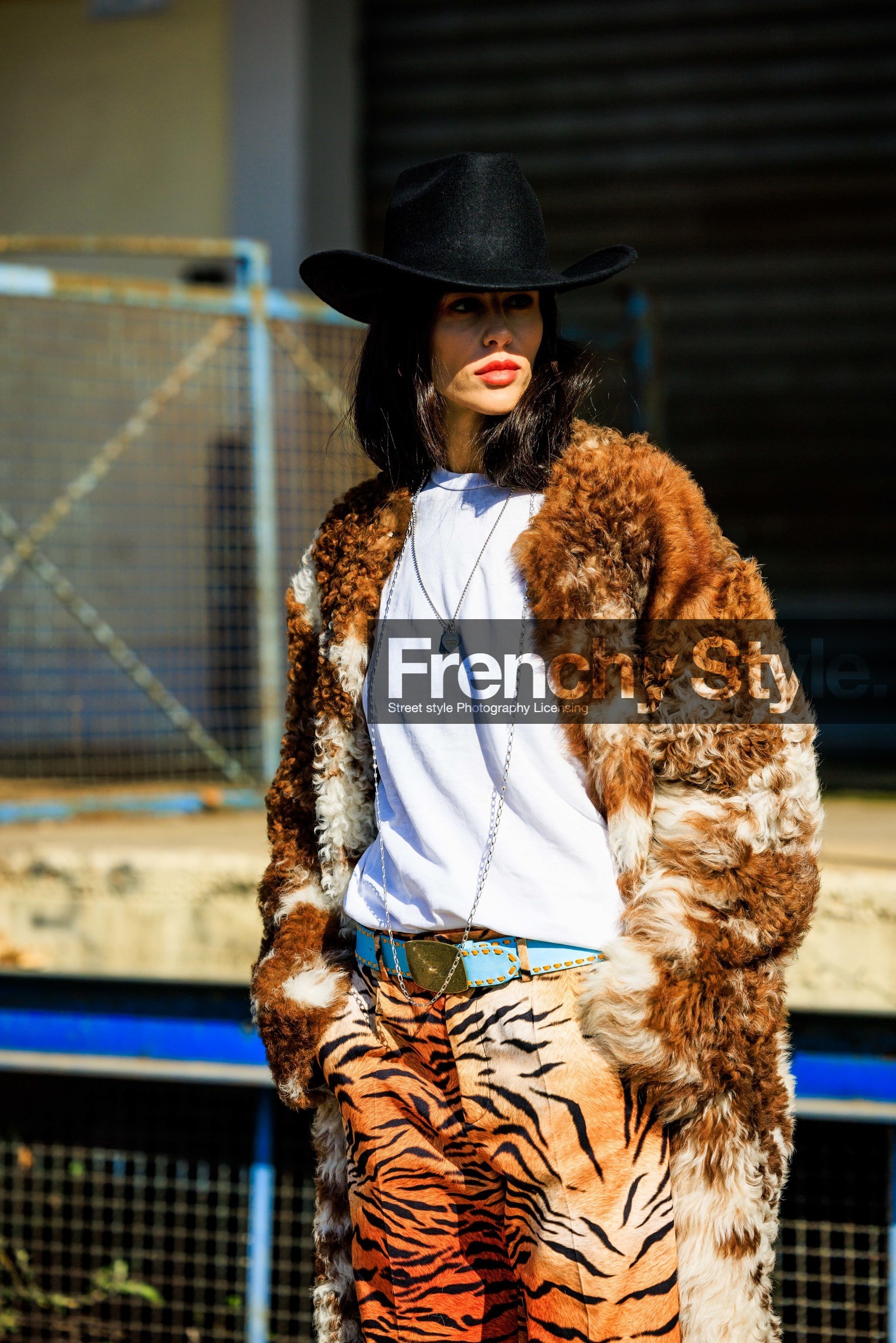 animall, print pants, tiger pants, cowboy hat: white tshirt, furry coat, brown coat, printed pants, buckle belt, blue belt, necklaces, gilda ambrosio, fashion week, frenchystyle, FW, jonathan paciullo, street style, vertical, atmosphere details, detail