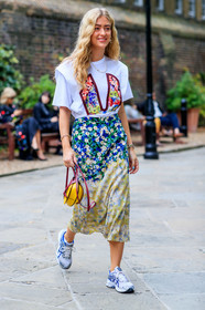 emili sindlev, floral print total look, white t-shirt, short sleeves t-shirt, floral printed skirt, floral printed t-shirt, mid long skirt, silk skirt, rolex watch, silvered and golden watch, silver and golden watch, man style watch, asics sneakers, silvered sneakers, white sneakers, blue sneakers, loewe bag, hand bag, burgundy leather bag, yellow leather bag, light green skirt, blue skirt, tie and dye skirt, pearl earrings, pearl necklace, fashion week, frenchystyle, FW, jonathan paciullo, street style, vertical, full length
