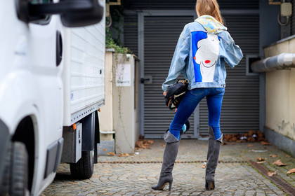 atmosphere details, AUTUMN WINTER 2017-2018, AW 17-18, back detail, black and white bag, black bag, blue denim, cartoon, denim jacket, denim pants, detail, embroidered jacket, FALL WINTER 2017-2018, fashion week, frenchystyle, FW, FW 17-18, grey boots, high boots, high heels, hoodie, horizontal, jeans, jonathan paciullo, leather bag, leather shoes, levi's, levi's strauss, MFW, MILAN, miu miu, model, multicolor sweater, ondria hardin, printed sweater, street style, trousers