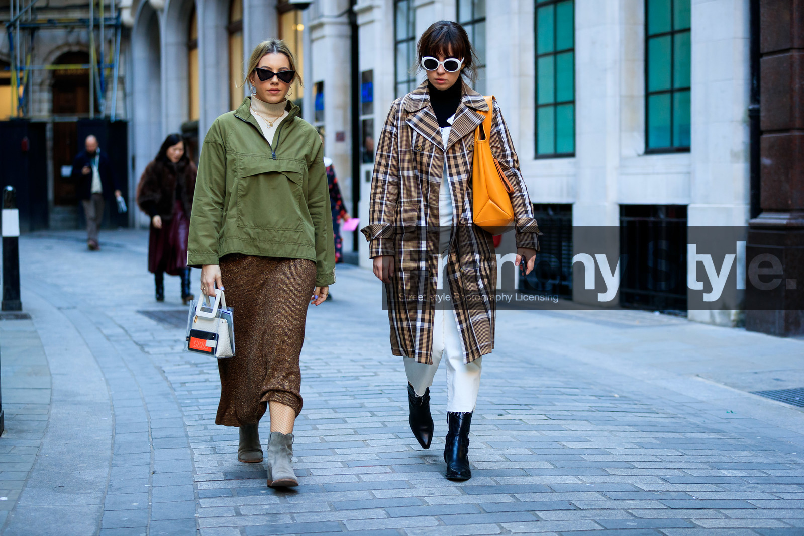 black shoes, brown coat, brown skirt, checked, graphic jacket, green jacket, grey boots, leather bag, leather shoes, orange bag, plaid, printed jacket, sunglasses, tartan, transparent bag, trousers, white pants, fashion week, frenchystyle, FW, jonathan paciullo, street style, LFW, LONDON, AUTUMN WINTER 2019-2020, AW 19-20, FW 19-20, FALL WINTER 2019-2020, horizontal, atmosphere details, full length