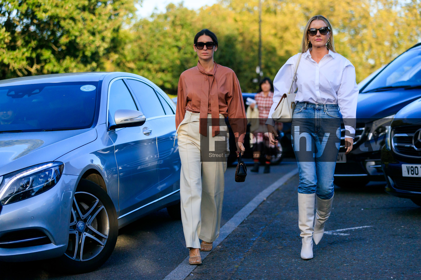 bedorah, deborah reyner sebag, leather shirt, brown leather shirt, lavalliere collar, white leather pants, high waist pants, belted pants, flare pants, square shape glasses, celine sunglasses, hand bag, animal printed bag, bottega veneta shoes, white leather shoes, squared toed shoes, chain detail shoes, white shirt, oversize shirt, balloon sleeves, light blue jeans, white leather boots, high boots, golden earrings, dangling earrings, fur bag, fashion week, frenchystyle, FW, jonathan paciullo, street style, atmosphere details, horizontal, full length