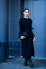 valentino earrings, dangling earrings, pearl earrings, strassed earrings, black total look, black leather boots, black leather bag, black leather clutch, studs bag, quilted bag, valentino bag, valentino dress, flat boots, split dress, tight dress, fiona zanetti, street style, jonathan paciullo, FW, frenchystyle, fashion week, MFW, MILAN, SPRING SUMMER 2021, SS 21, vertical, full length