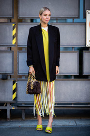 black jacket, yellow dress, light green dress, white dress, fringe dress, mid long dress, asymetrical dress, suede bag, plaited bag, big chain strap bag, golden chain strap bag, golden earrings, hoop earrings, chain earrings, light green slippers, light green sandals, bottega veneta bag, leonie hanne, street style, jonathan paciullo, FW, frenchystyle, fashion week, MFW, MILAN, SPRING SUMMER 2021, SS 21, vertical, full length