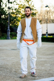 white sweatshirt, white trousers, orange tshirt, brown vest, sleeveless vest, white gloves: grey shoes, sporty look, fashion week, frenchystyle, FW, jonathan paciullo, street style, PARIS, PFW, SPRING SUMMER 2022, SS 22, full length, vertical, simon jacquemus
