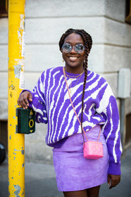 purple skirt, purple pullover, zebra printed pullover, suede skirt, mini skirt, pink leather bag, quilted bag, mini bag, chanel bag, square shape bag, round shape sunglasses, blue sunglasses, striped pullover, purple total look, lois opoku, street style, jonathan paciullo, FW, frenchystyle, fashion week, MFW, MILAN, SPRING SUMMER 2021, SS 21, vertical, detail