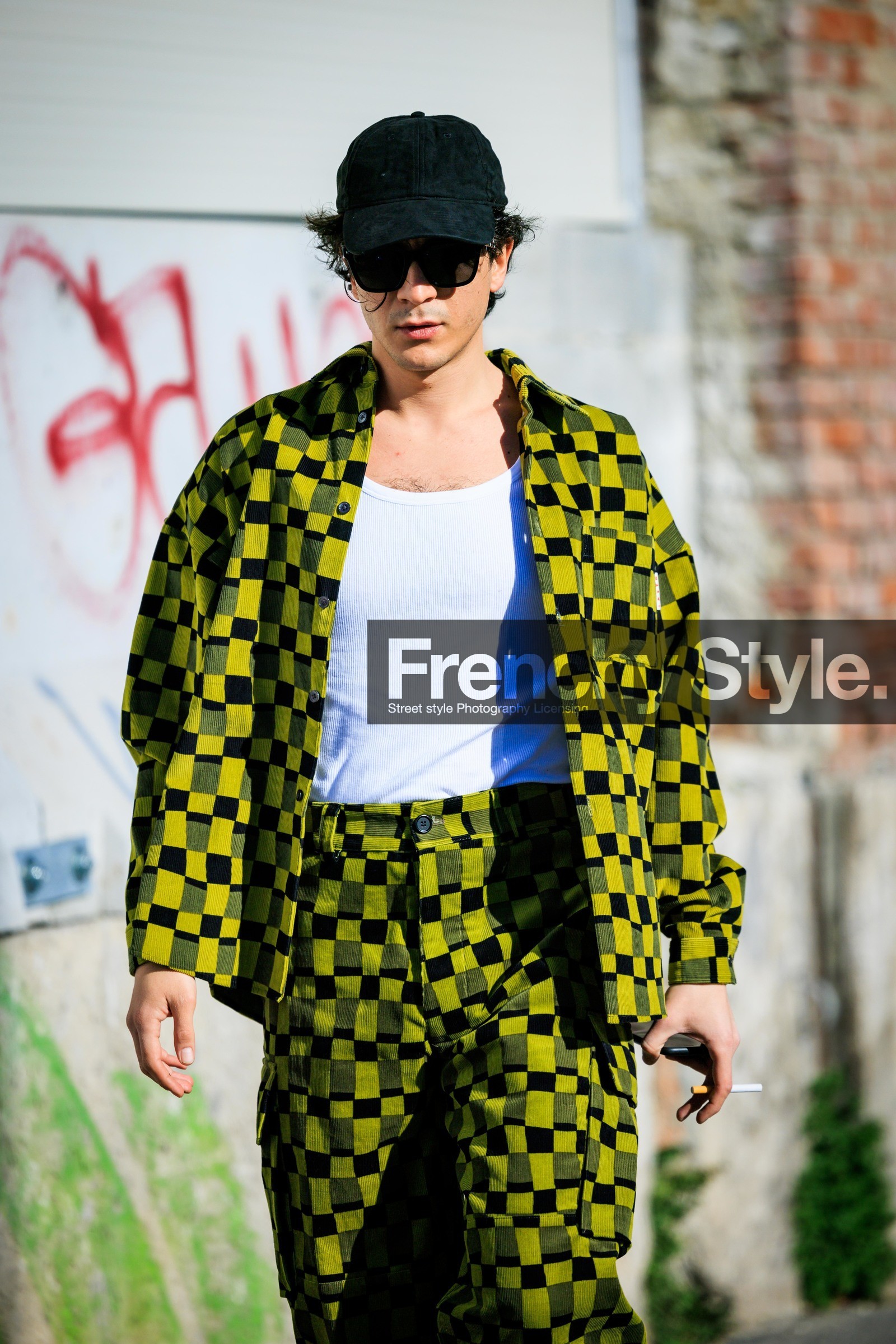 black cap: white tank top, print suit, checkered suit, black and yelllow suit, printed jacket, printed pants, white sneakers, fashion week, frenchystyle, FW, jonathan paciullo, street style, vertical, atmosphere details, detail