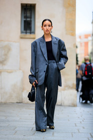 grey jacket, grey pants, striped jacket, striped pants, patchwork jacket, patchwork pants, oversize jacket, oversize pants, oversize suits, prada bag, black bag, dangling earrings, silvered earrings, black earrings, prada earrings, black leather pumps, golden buckle shoes, sharp end shoes, balenciaga shoes, alexandra guerain, fashion week, frenchystyle, FW, jonathan paciullo, street style, PFW, PARIS, SPRING SUMMER 2022, SS 22, vertical, full length