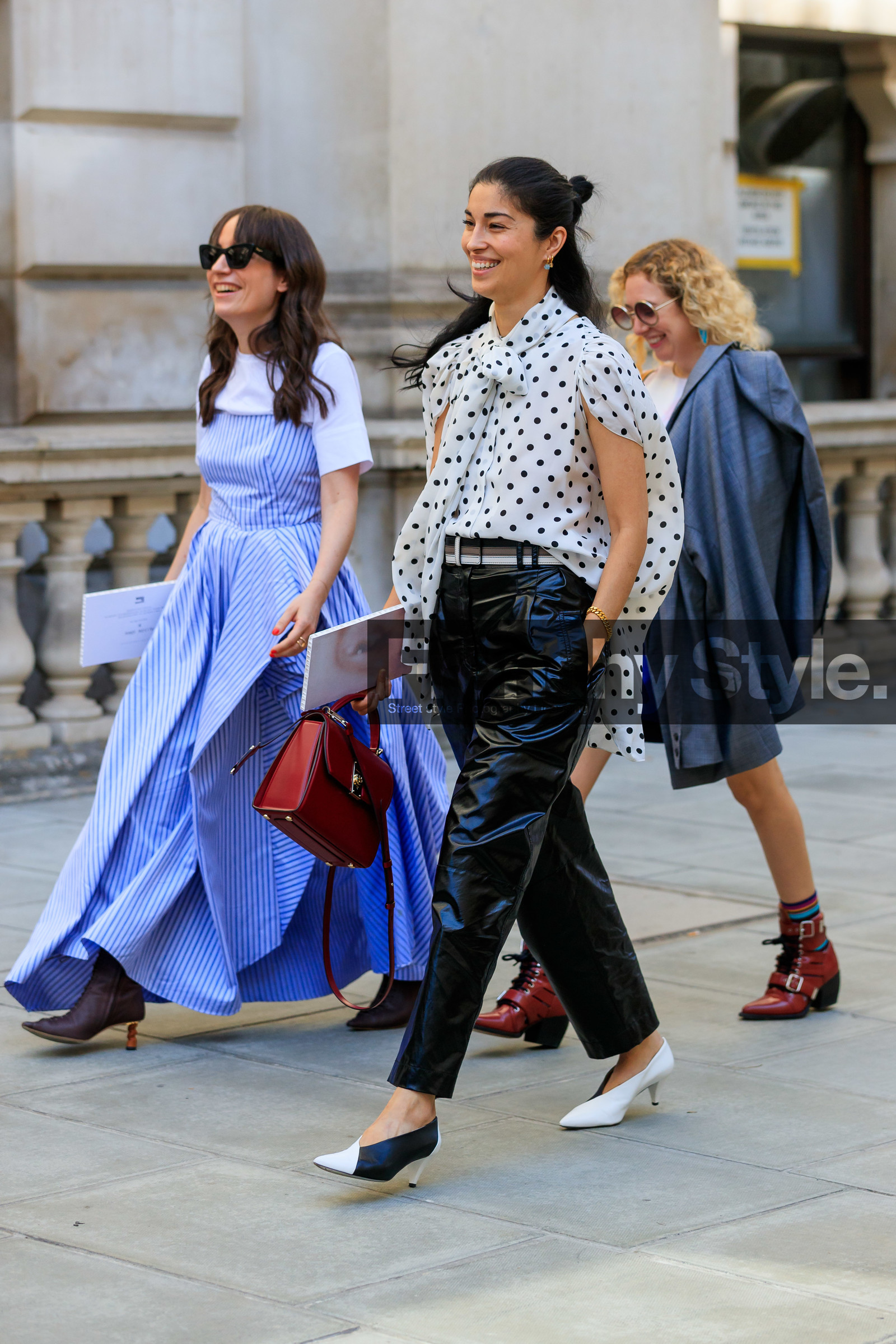 caroline issa, polka dots blouse, black and white blouse, white blouse, lavalliere collar, sleeveless blouse, black pants, black vinyl pants, black and white shoes, kitten heels shoes, red leather bag, hand bag, black leather belt, beige leather belt, fashion week, frenchystyle, FW, jonathan paciullo, street style, vertical, full length