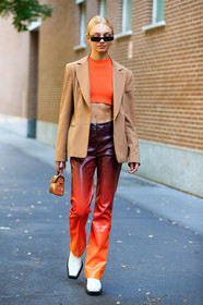 black sunglasses, small sunglasses, futurist shape sunglasses, orange top, knit top, knitwear, cropped top, beige jacket, red pants, orange pants, tie and dye pants, leather pants, leather bag, mini bag, camel leather bag, animal skin bag, hand bag, nose piercing, sleeveless top, red leather pants, fashion week, frenchystyle, FW, jonathan paciullo, street style, MFW, MILAN, SPRING SUMMER 2021, SS 21, vertical, full length