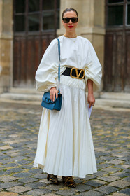 kerry pieri, white dress, long sleeves dress, pleated dress, long dress, balloon sleeves, belted dress, black leather belt, big belt, golden buckle belt, valentino belt, black sunglasses, big sunglasses, futurist shape sunglasses, valentino bag, blue leather bag, shoulder bag, animal printed boots, fur boots, black boots, camel boots, cartier ring, fashion week, frenchystyle, FW, jonathan paciullo, street style, PFW, PARIS, SPRING SUMMER 2020, SS 20, horizontal, full length